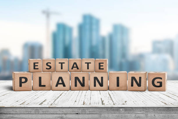 estate planning sign on a wooden pier with tall buildings in the background